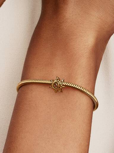 Sun Openwork Charm