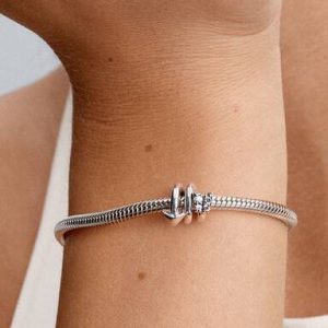 Twisting Arrow Charm